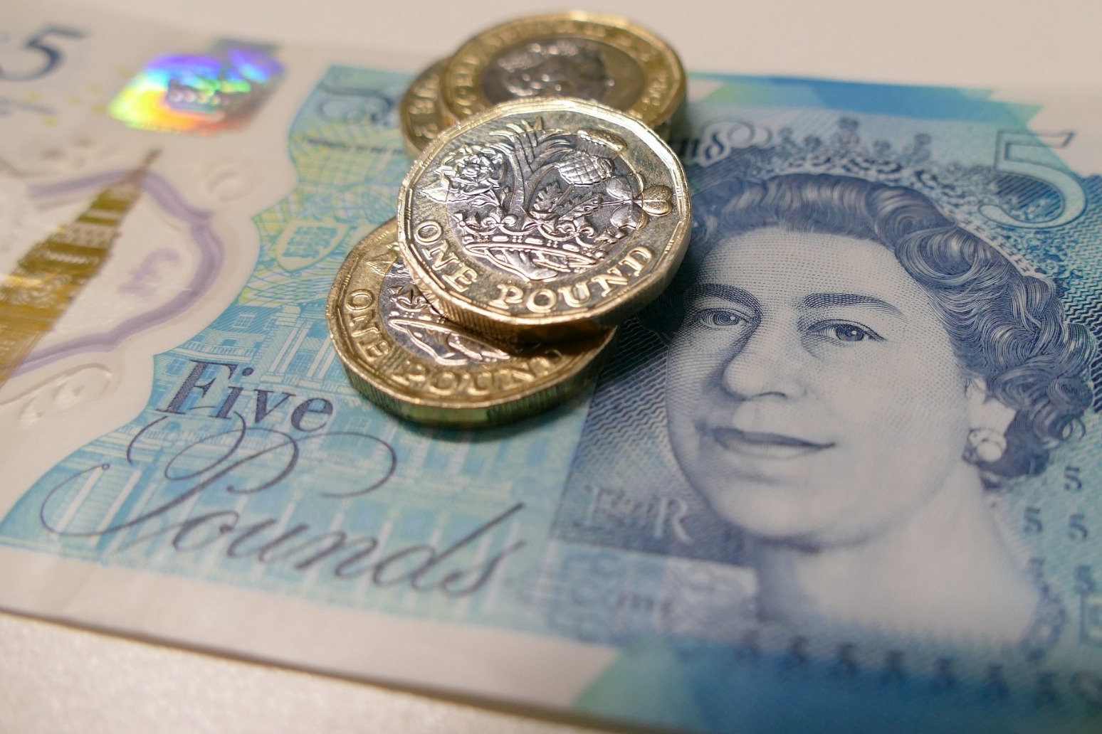 Sterling edges higher as investors eye Brexit talks